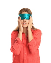 Photo of Young woman with light blue blindfold on white background