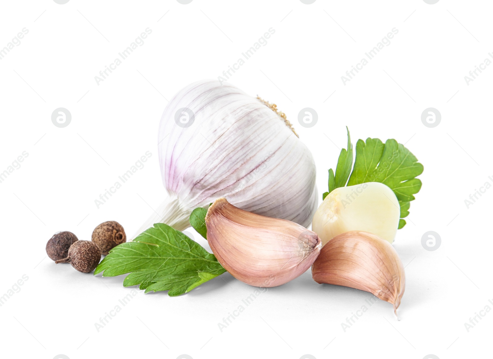 Photo of Fresh garlic, parsley and allspice on white background