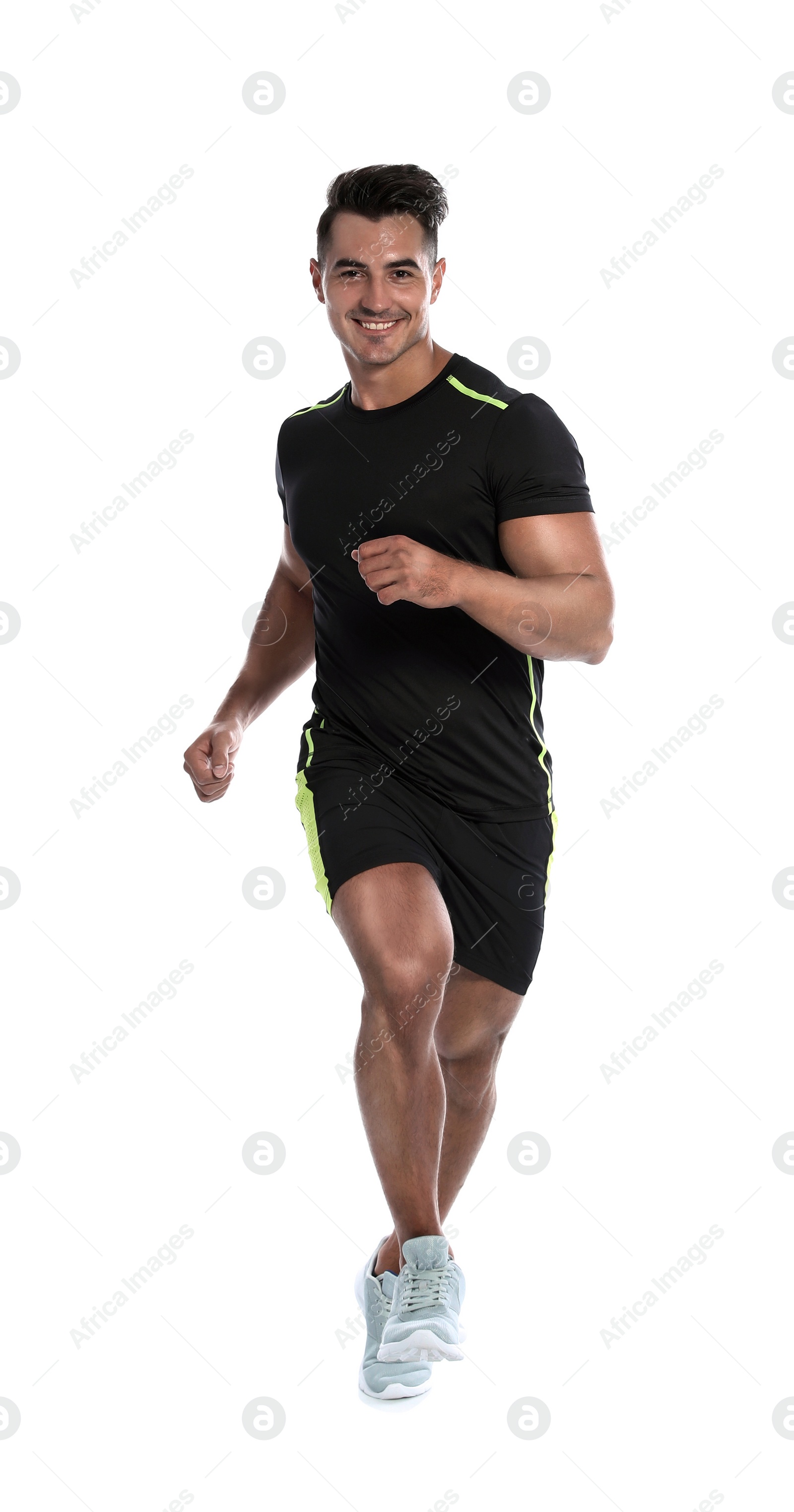 Photo of Sporty young man running on white background