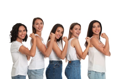 Photo of Happy women posing on white background. Girl power concept