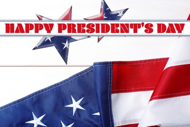 Image of Happy President's Day - federal holiday. American flag and text on white wooden background, top view