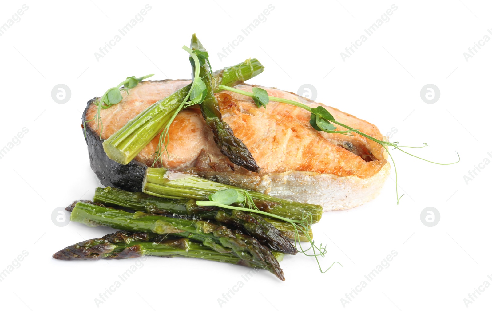 Photo of Tasty salmon steak with asparagus isolated on white