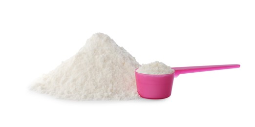 Photo of Powdered infant formula and scoop on white background. Baby milk