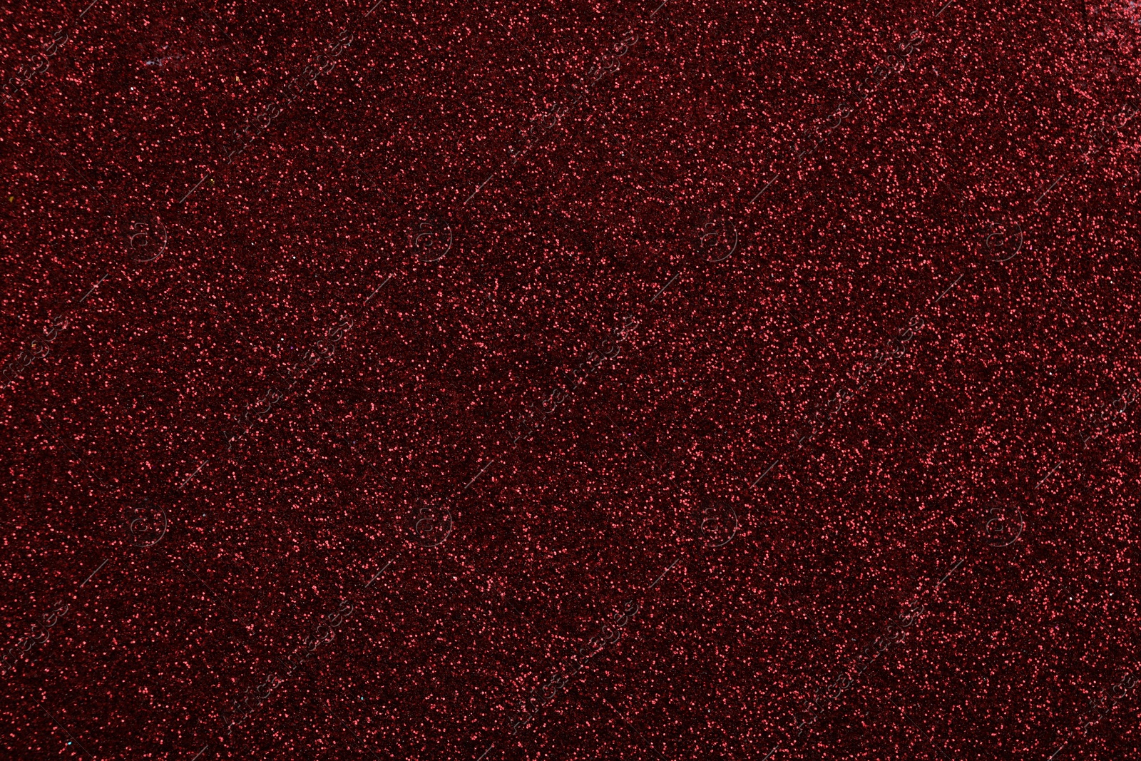 Photo of Beautiful shiny burgundy glitter as background, closeup