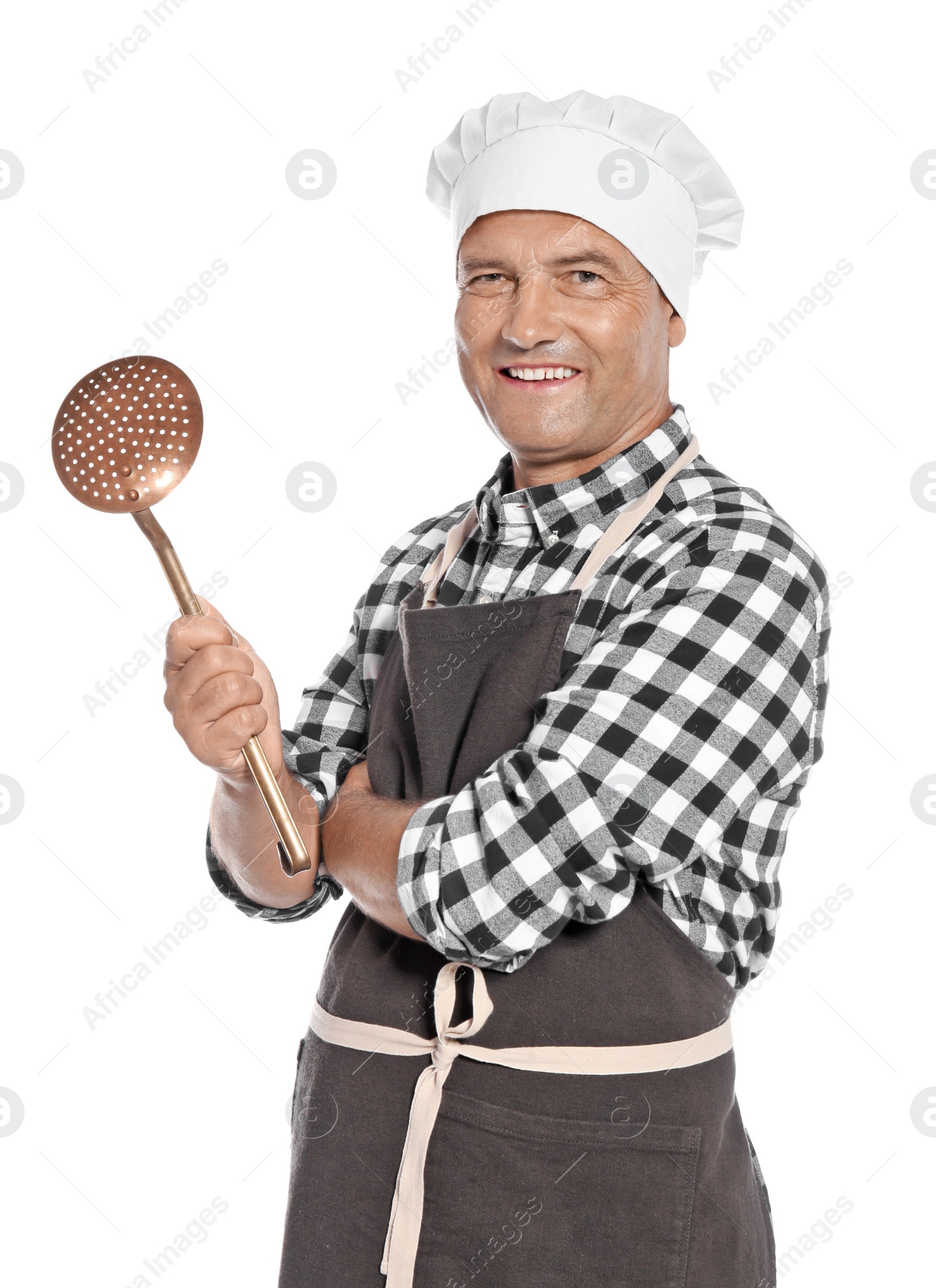 Photo of Mature male chef holding skimmer on white background