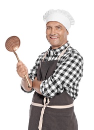 Photo of Mature male chef holding skimmer on white background