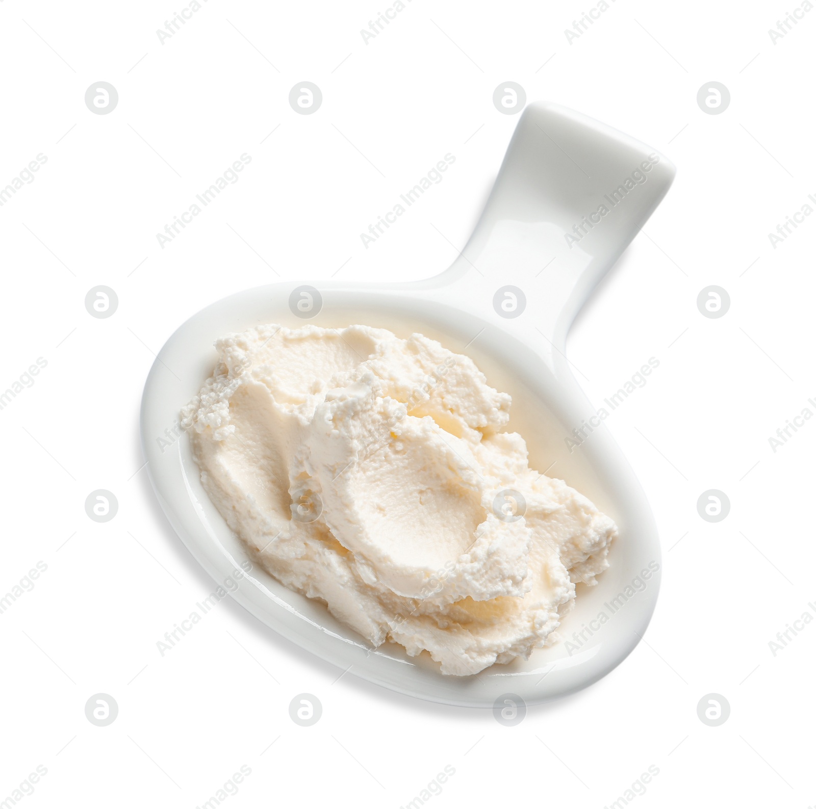 Photo of Serving spoon with tasty cream cheese on white background, top view. Space for text