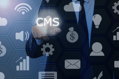 Image of CMS. Man using virtual screen, closeup. Scheme with icons on blue background