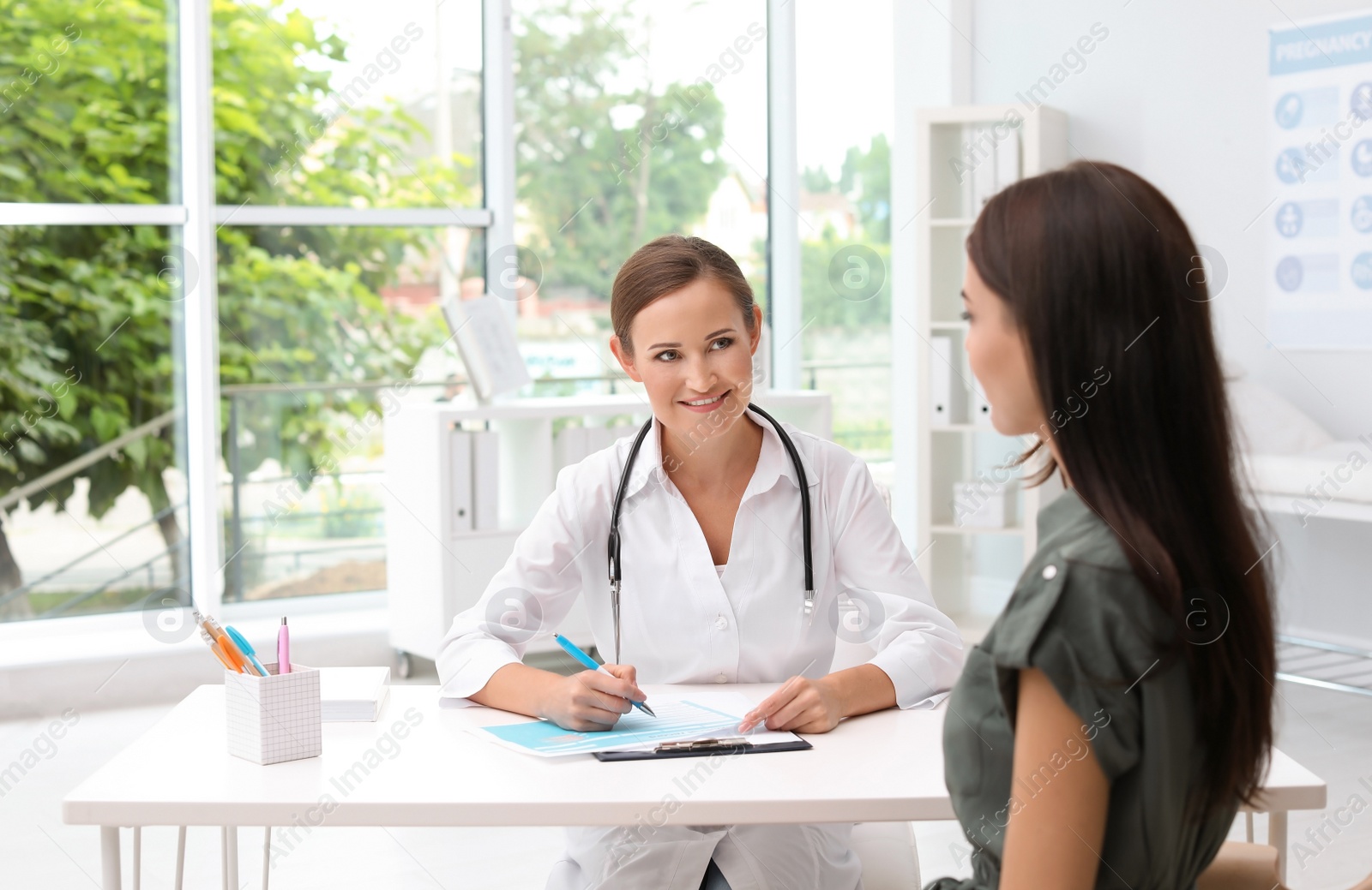 Photo of Patient having appointment with doctor in hospital