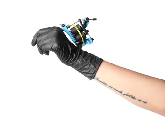 Photo of Professional tattoo artist with machine on white background, closeup