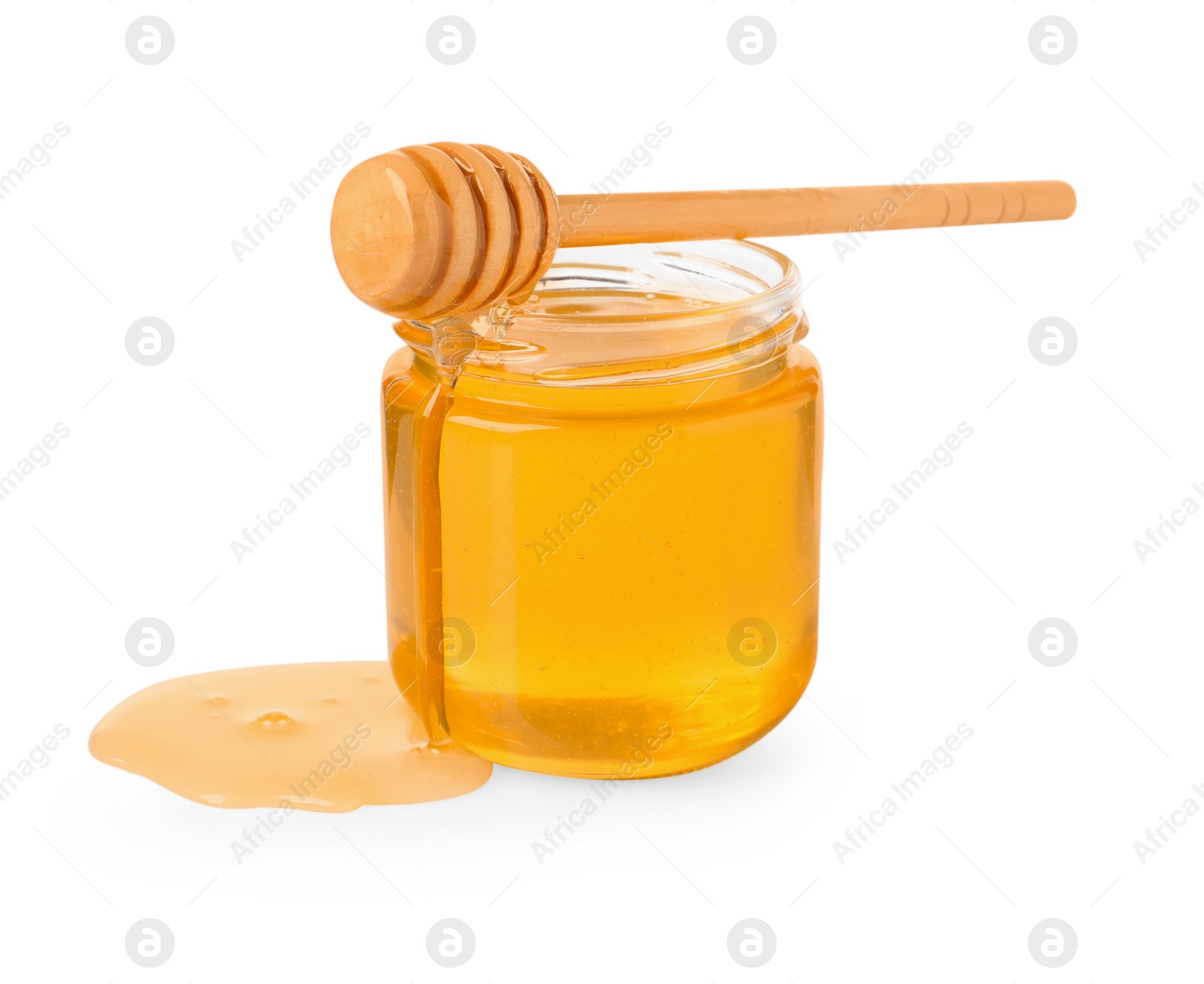 Photo of Tasty honey in glass jar and dipper isolated on white