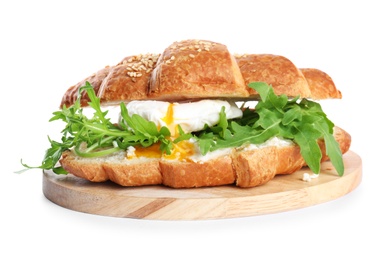 Photo of Delicious croissant with arugula and egg isolated on white