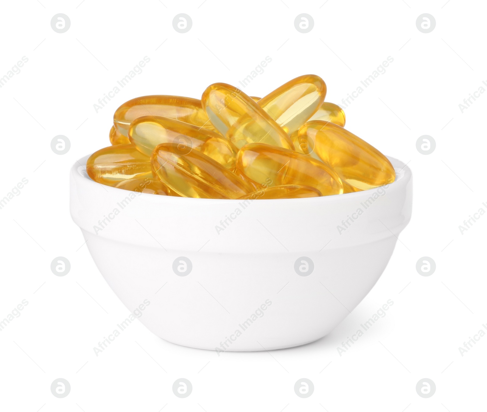 Photo of Yellow vitamin capsules in bowl isolated on white