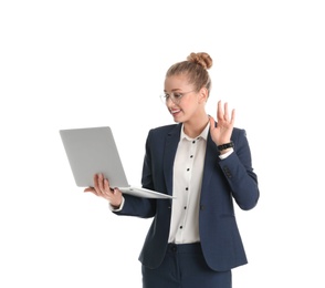 Young businesswoman using laptop on white background