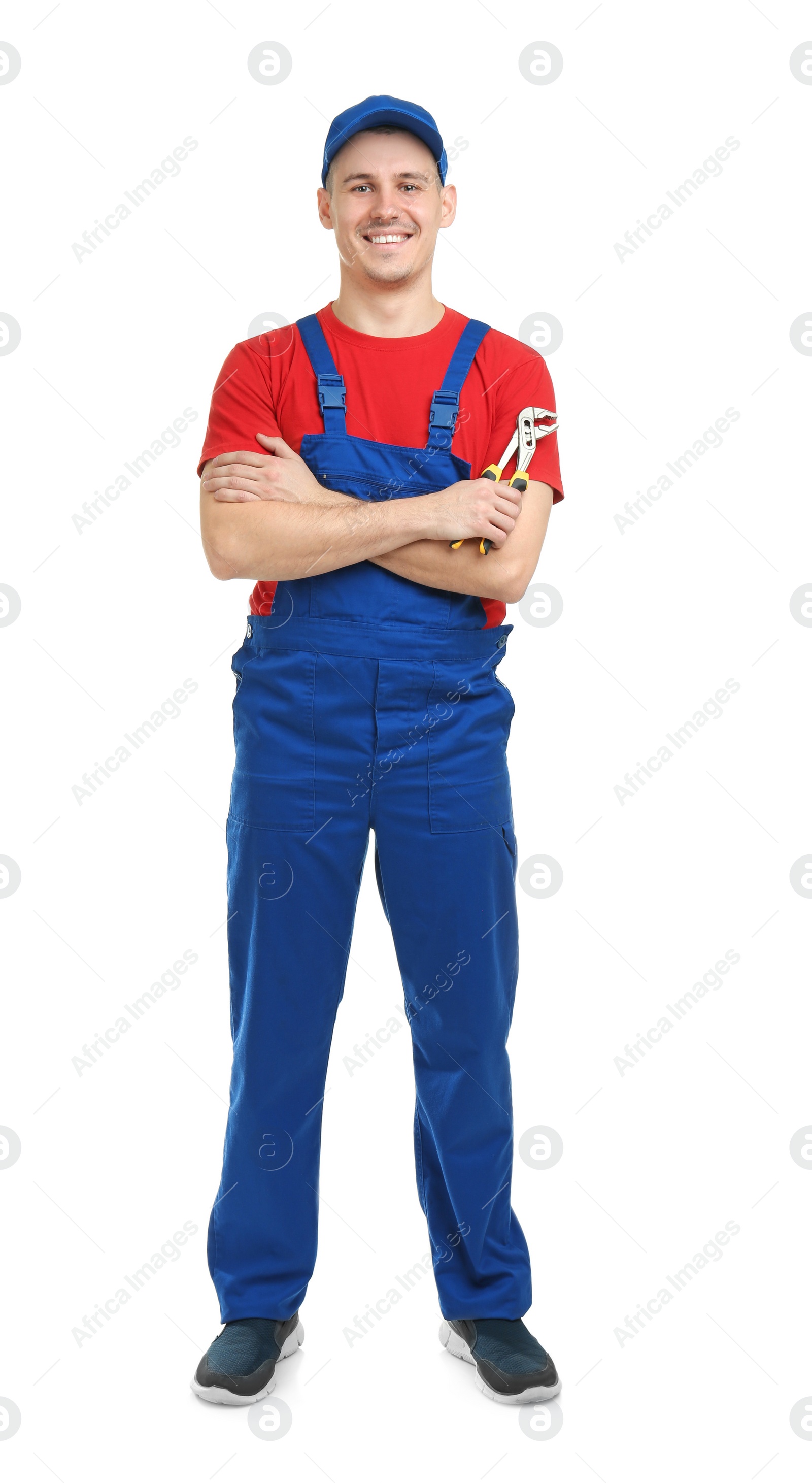 Photo of Young plumber with adjustable wrench on white background