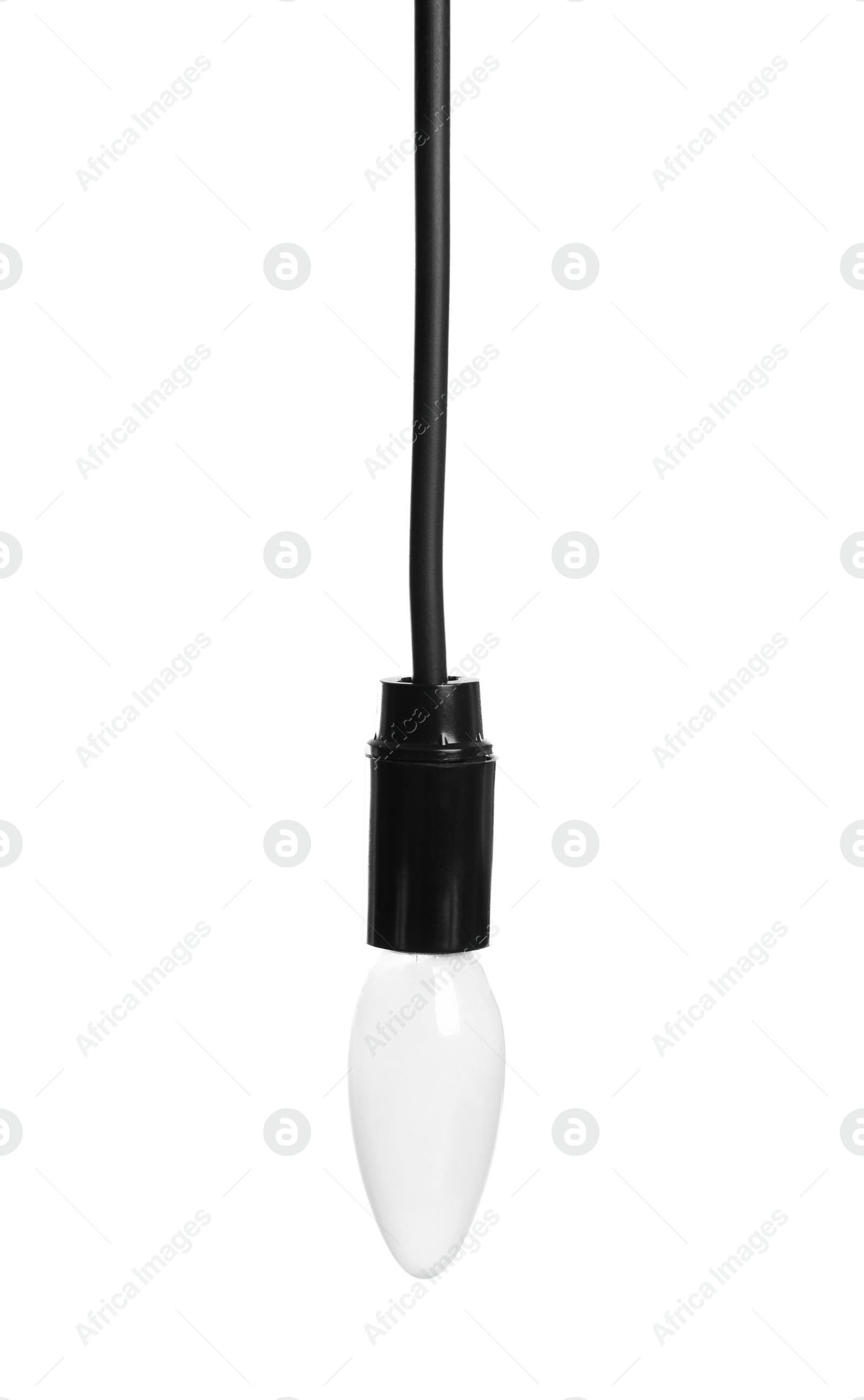 Photo of New incandescent light bulb for lamp on white background