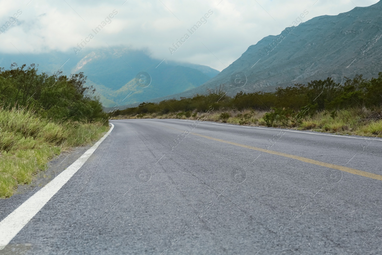 Image of Empty asphalt road in mountains. Picturesque landscape