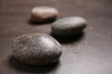 Spa stones on table. Space for text