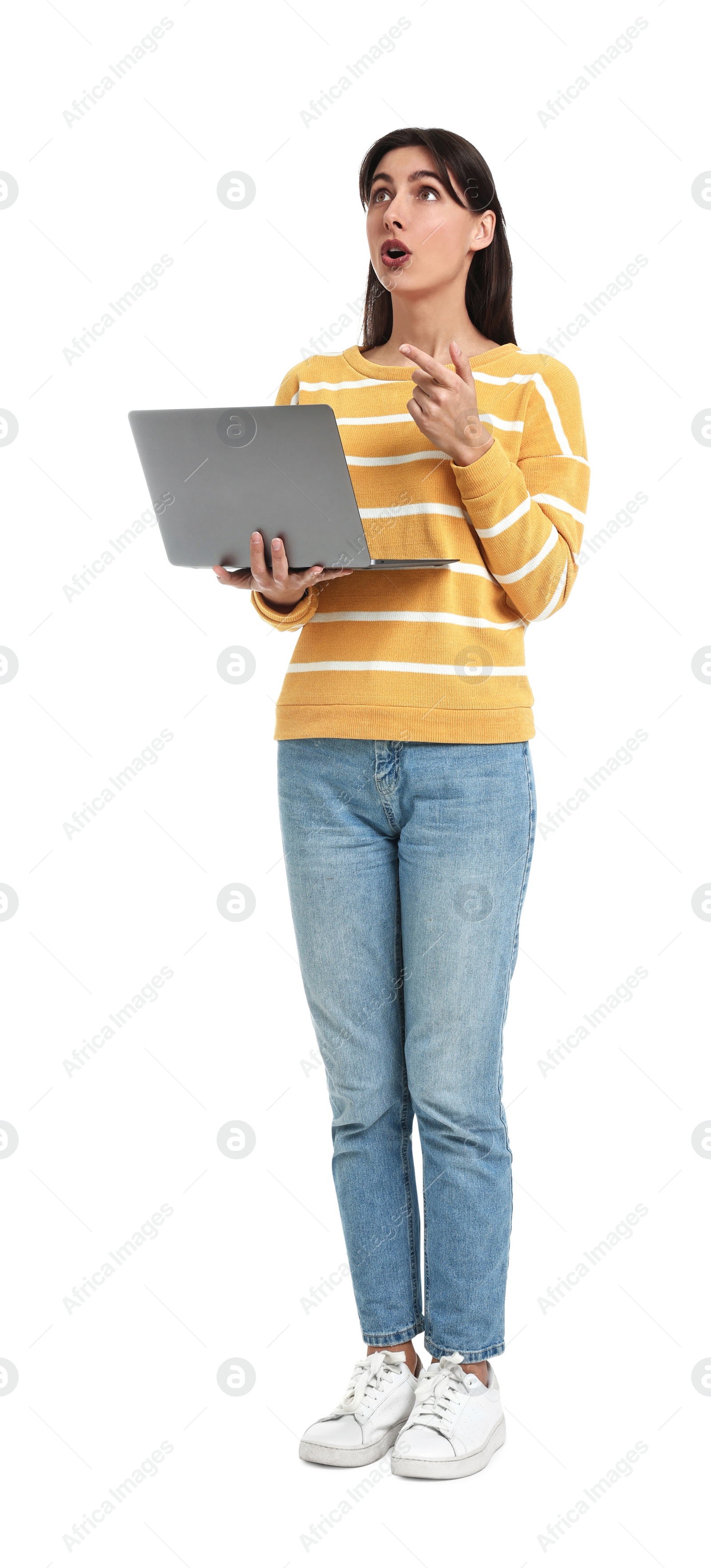 Photo of Surprised woman using laptop on white background