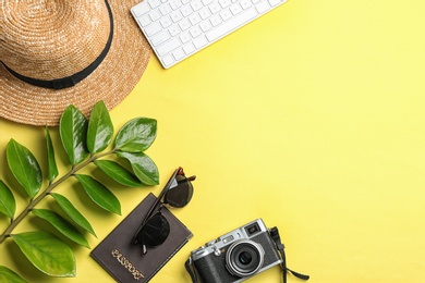 Photo of Flat lay composition with accessories, camera and space for text on color background. Travel blogger