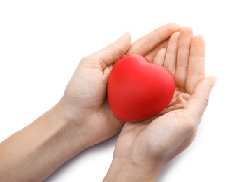 Photo of Woman holding red heart on white background, closeup. Cardiology concept