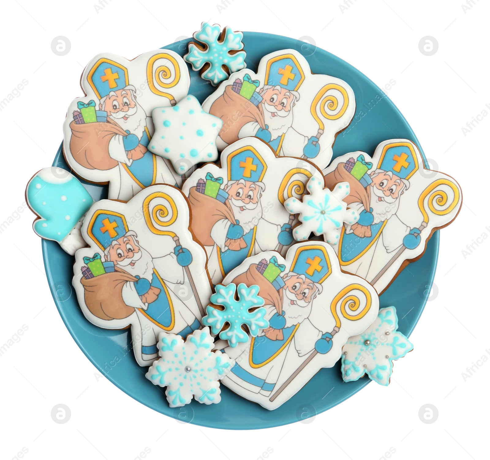 Photo of Tasty gingerbread cookies on white background, top view. St. Nicholas Day celebration