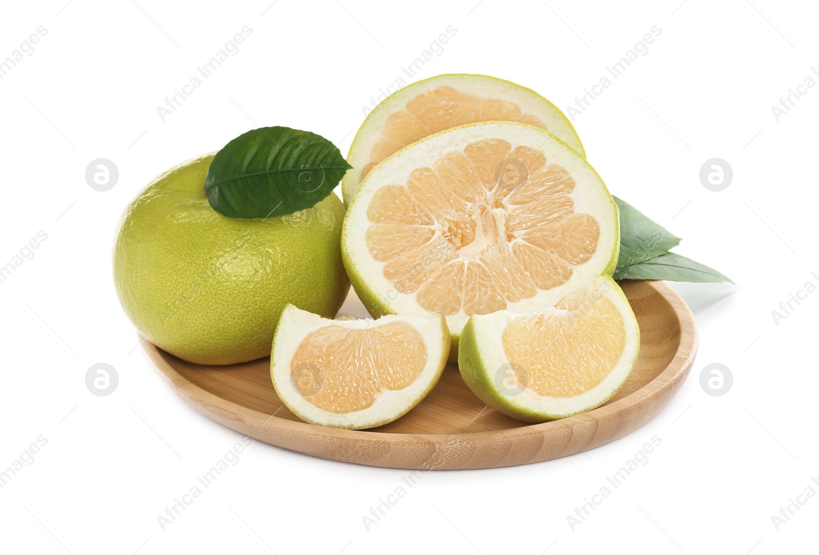 Photo of Whole and cut sweetie fruits with green leaves on white background