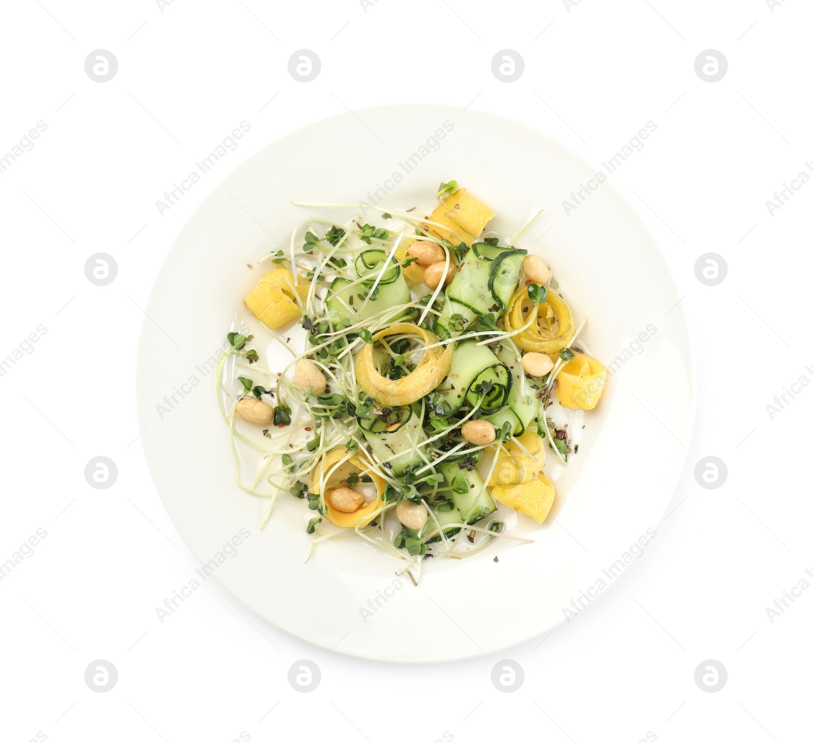 Photo of Delicious fresh carrot salad with cucumber isolated on white, top view