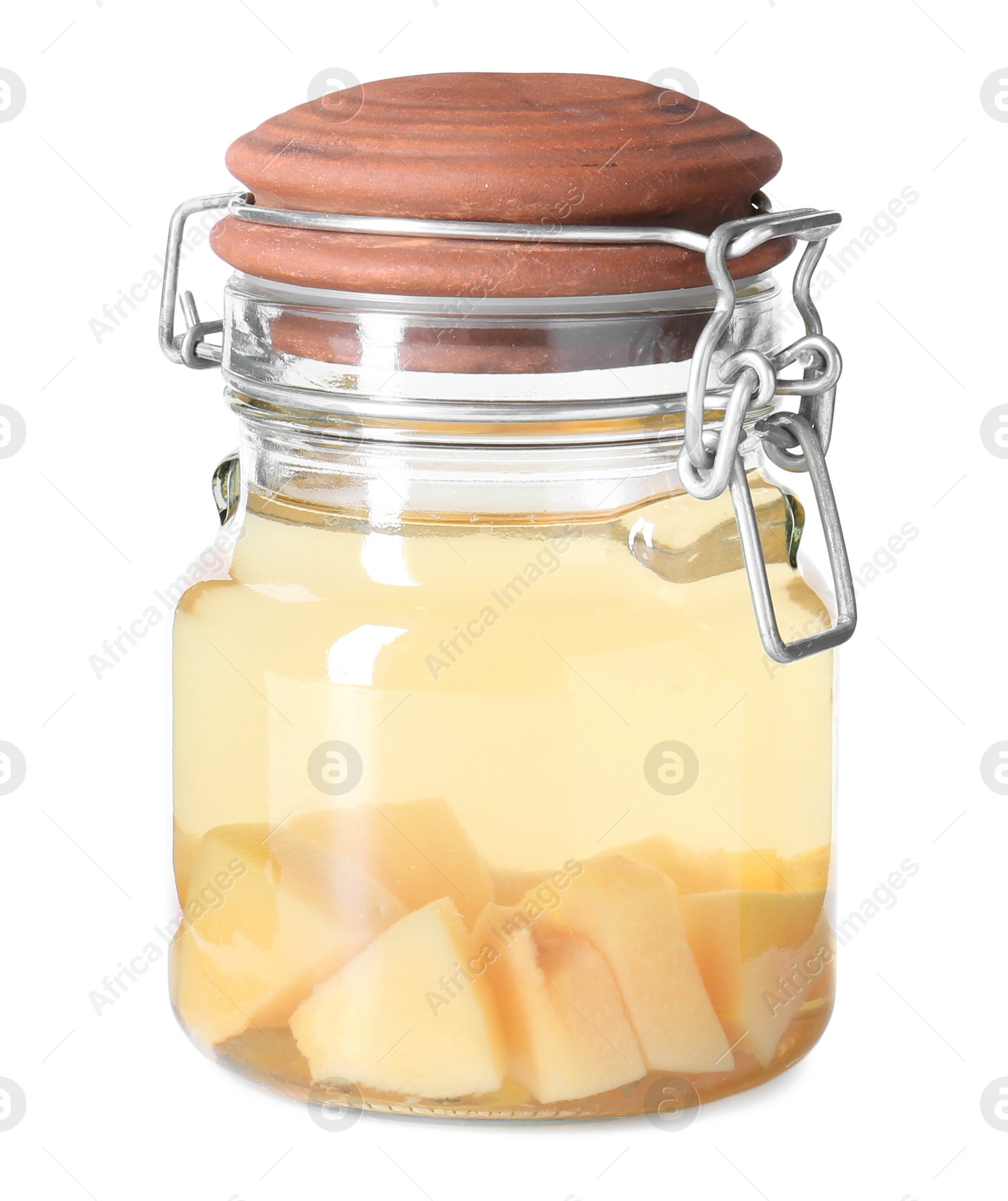 Photo of Delicious quince drink in glass jar isolated on white