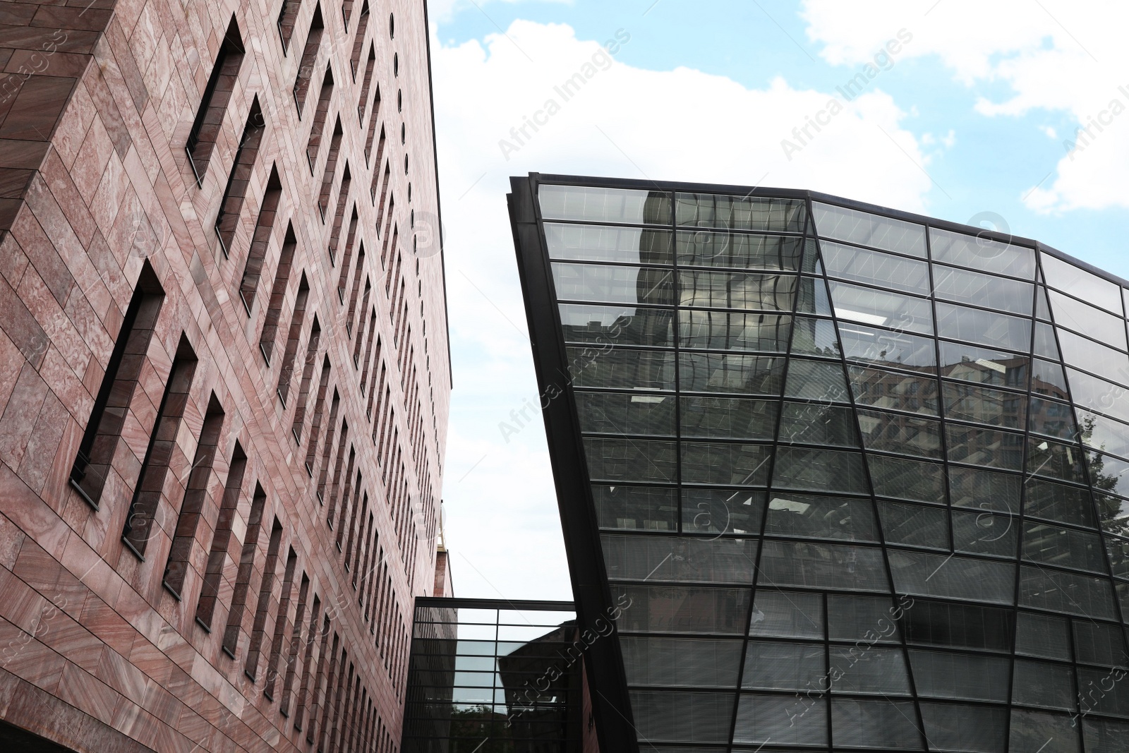 Photo of Exterior of modern buildings in city, low angle view