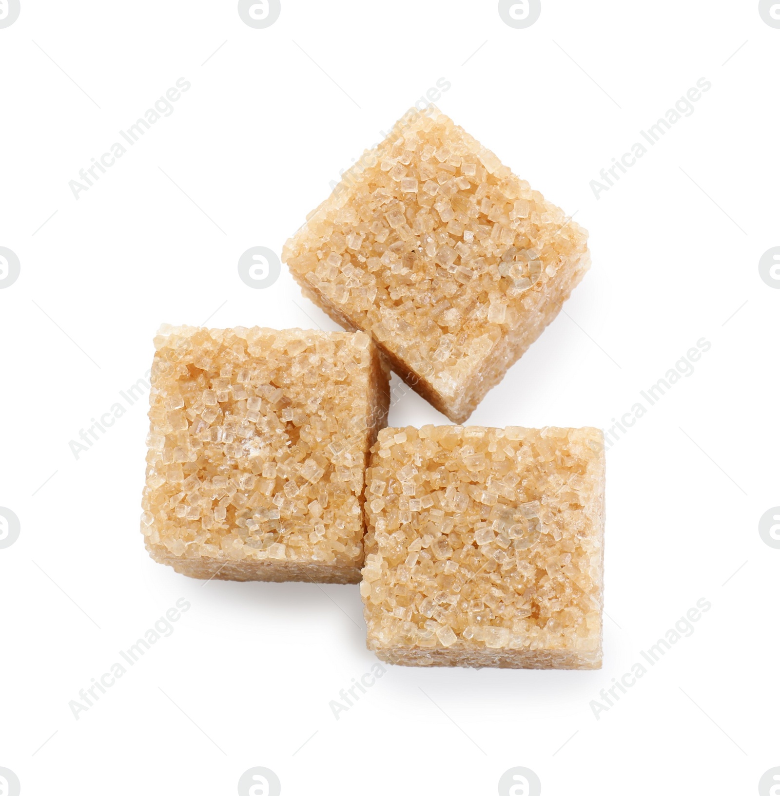 Photo of Three brown sugar cubes isolated on white, top view