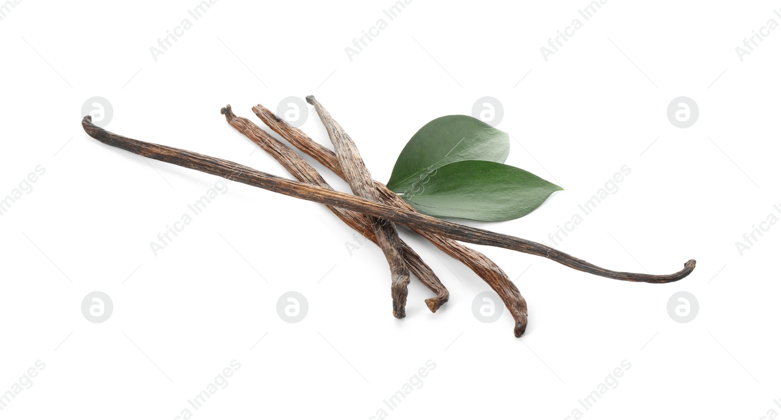 Photo of Aromatic vanilla pods and leaves isolated on white