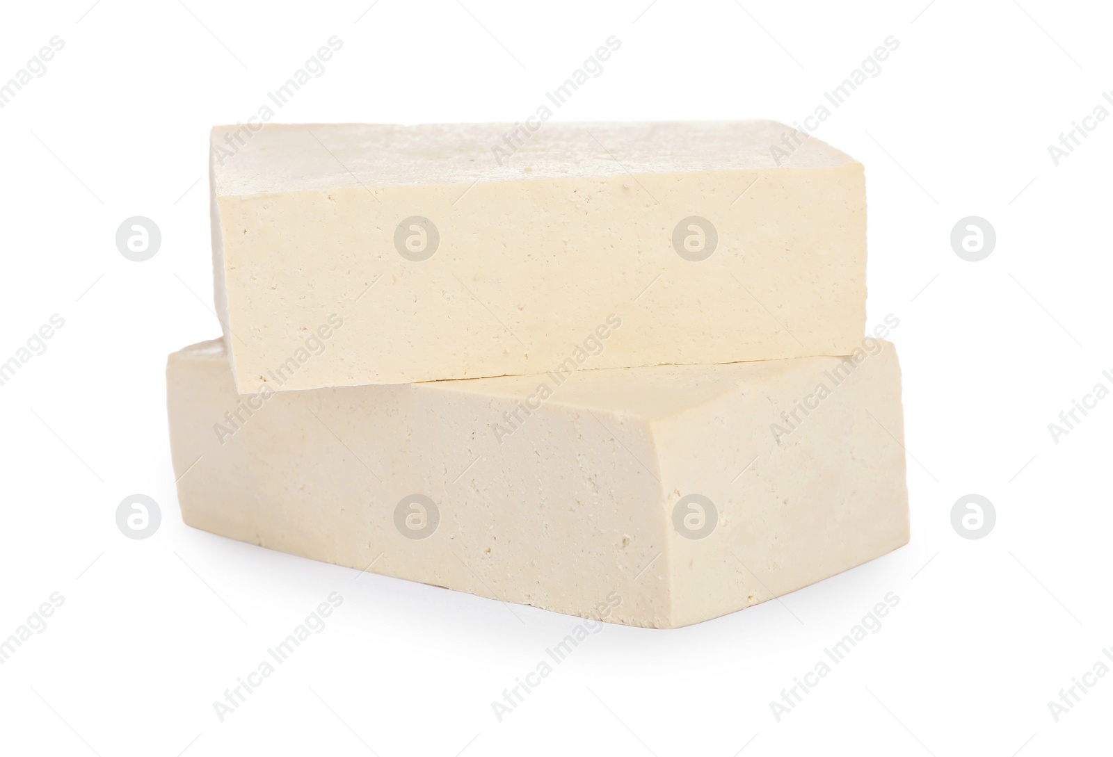 Photo of Blocks of delicious raw tofu on white background