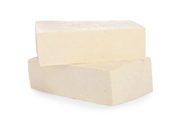 Photo of Blocks of delicious raw tofu on white background