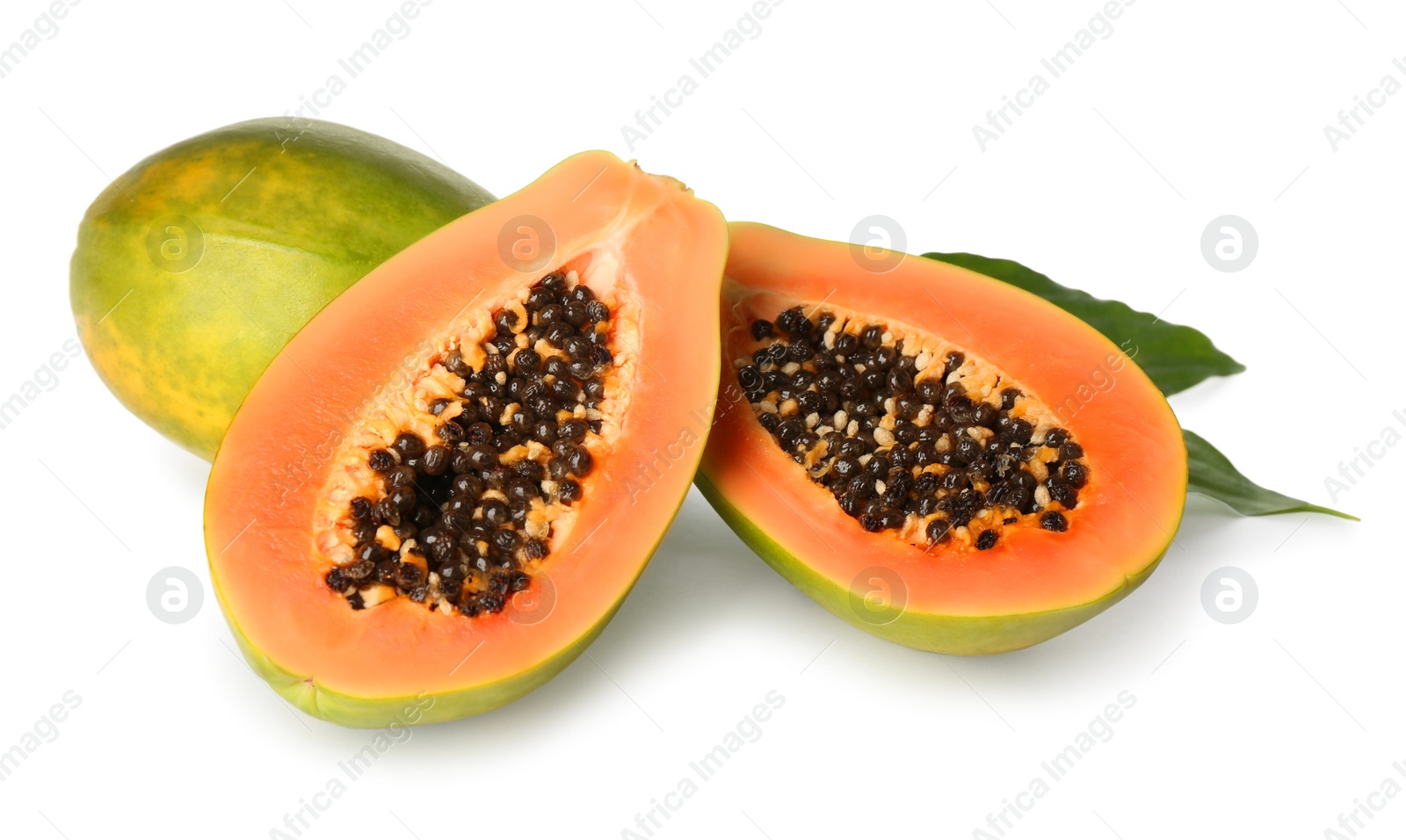 Photo of Fresh ripe papaya fruits with green leaves on white background