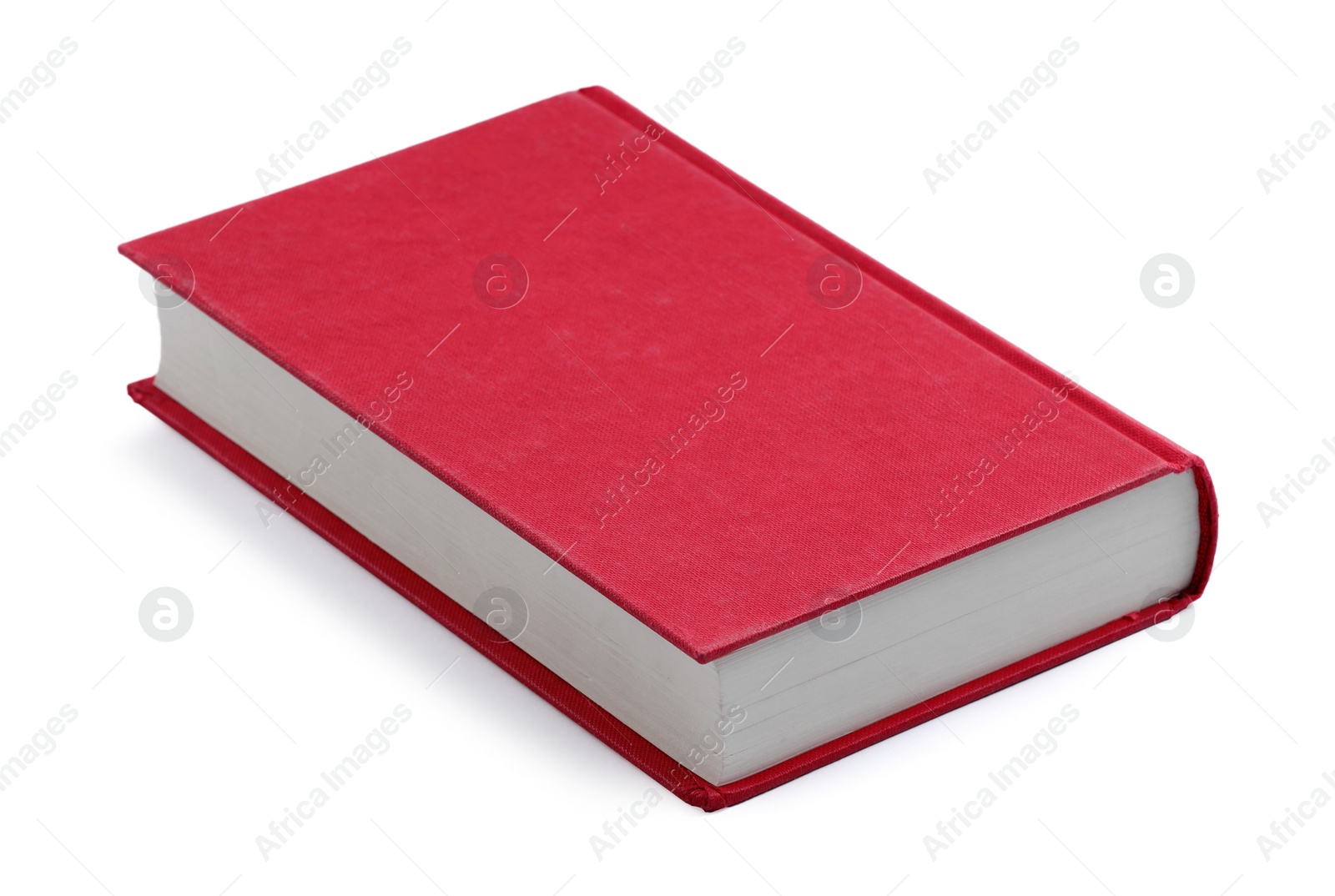 Photo of One closed red hardcover book isolated on white