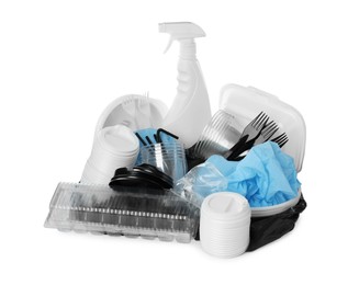 Photo of Pile of different plastic items on white background