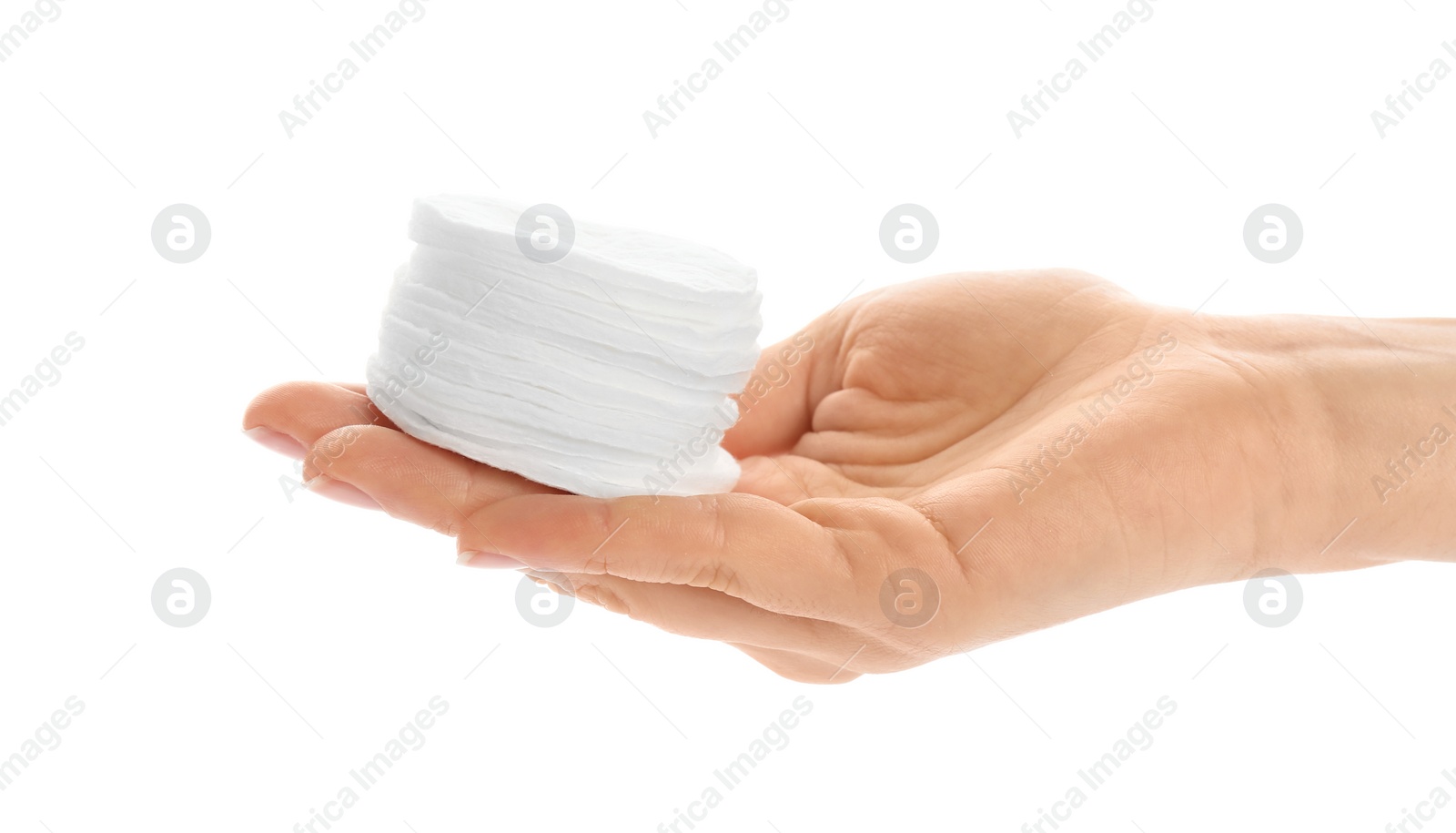 Photo of Woman holding cotton pads on white background, closeup