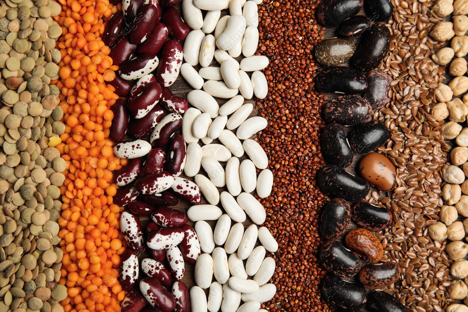 Photo of Different grains and seeds as background, top view. Veggie diet