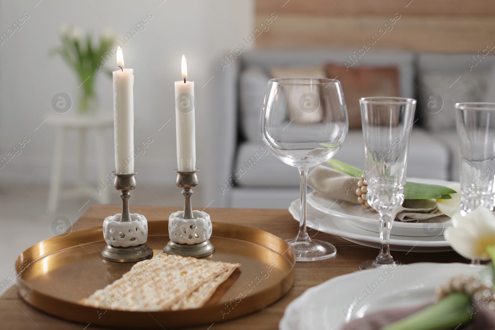 Photo of Festive Passover table setting at home. Pesach celebration