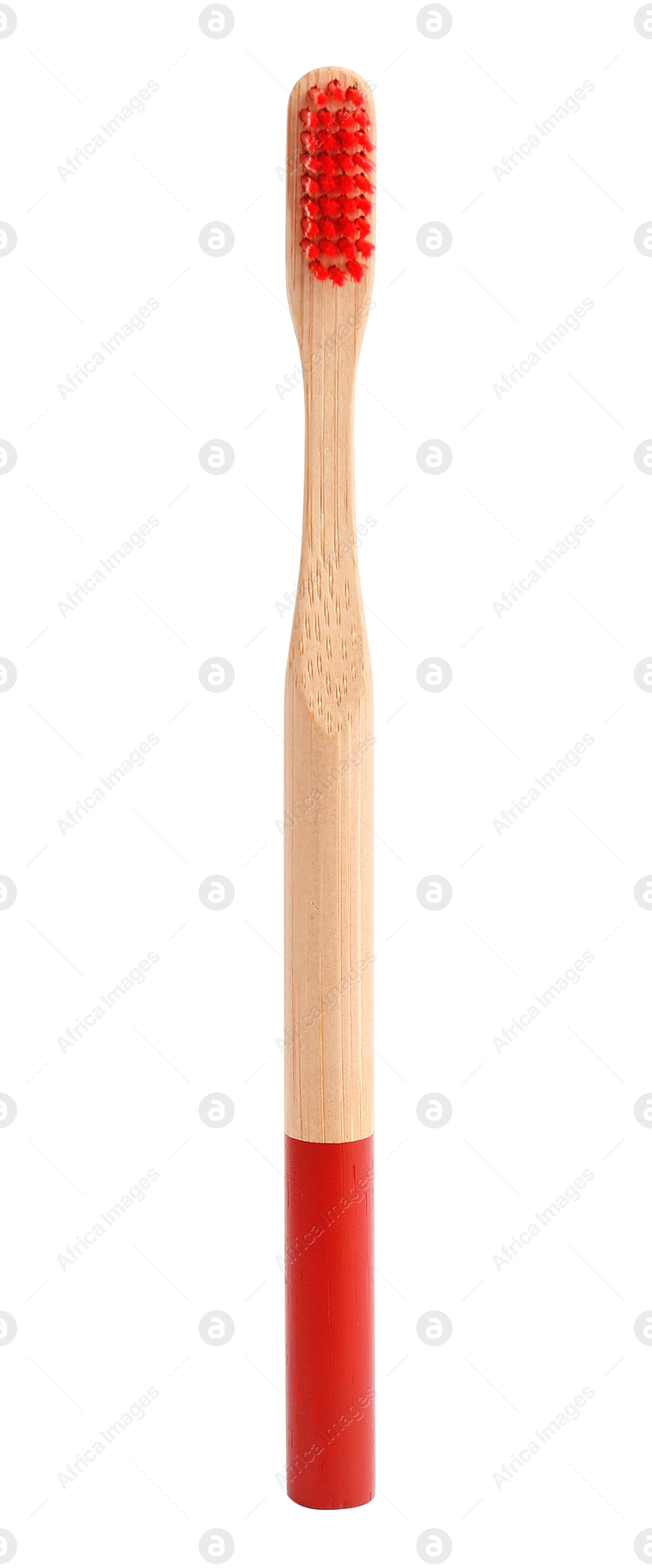 Photo of Bamboo toothbrush with red bristle isolated on white