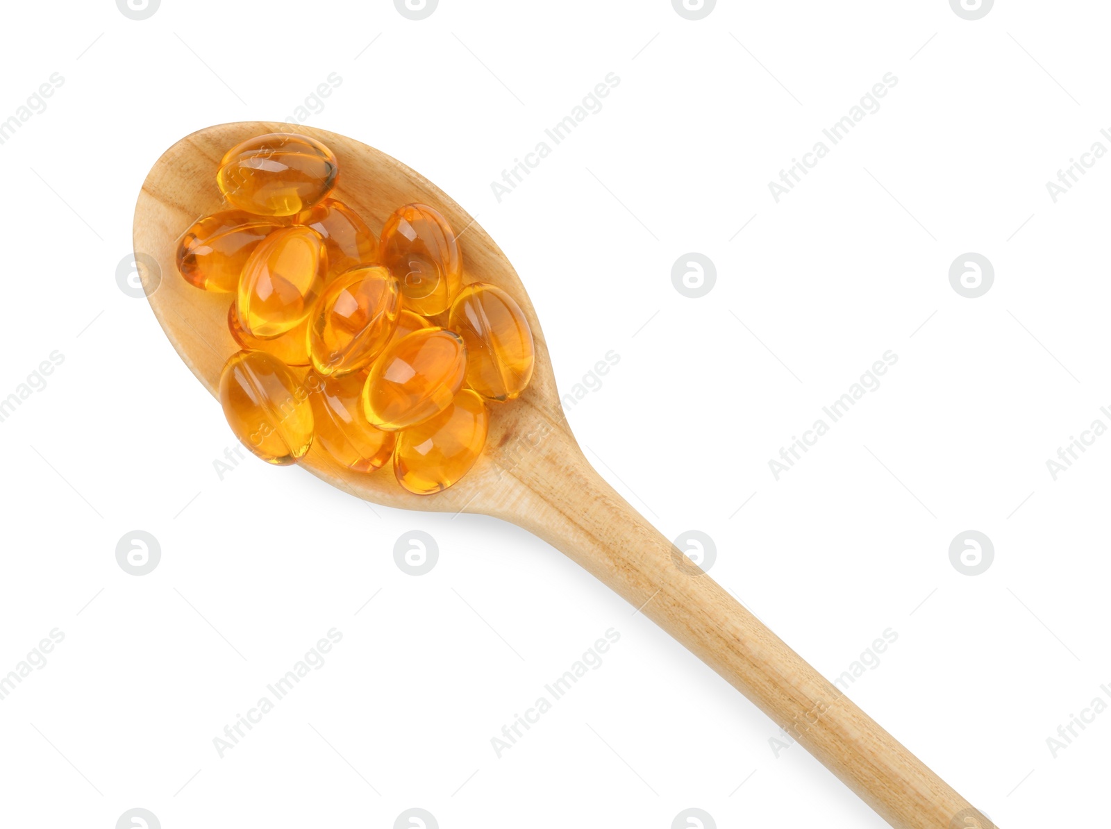 Photo of Vitamin capsules in wooden spoon isolated on white, top view. Health supplement