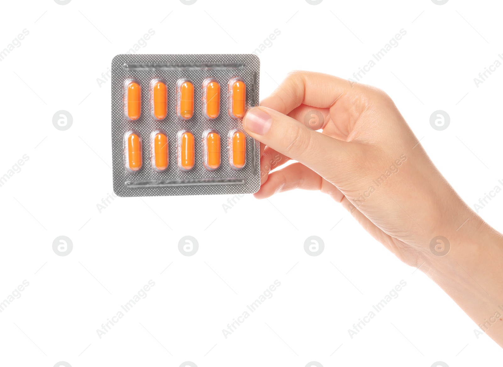 Photo of Woman holding pills in blister pack on white background, closeup