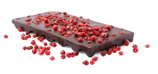 Photo of Dark chocolate bar with red peppercorns isolated on white