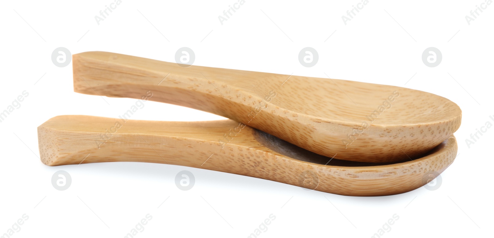 Photo of Two new wooden spoons on white background