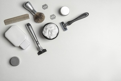 Photo of Flat lay composition with men's shaving accessories and space for text on white background