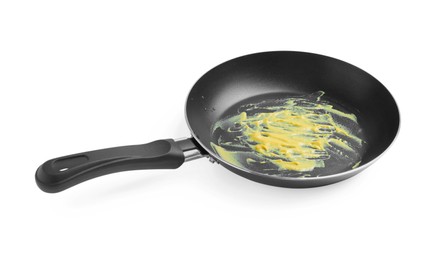 Dirty non-stick frying pan on white background