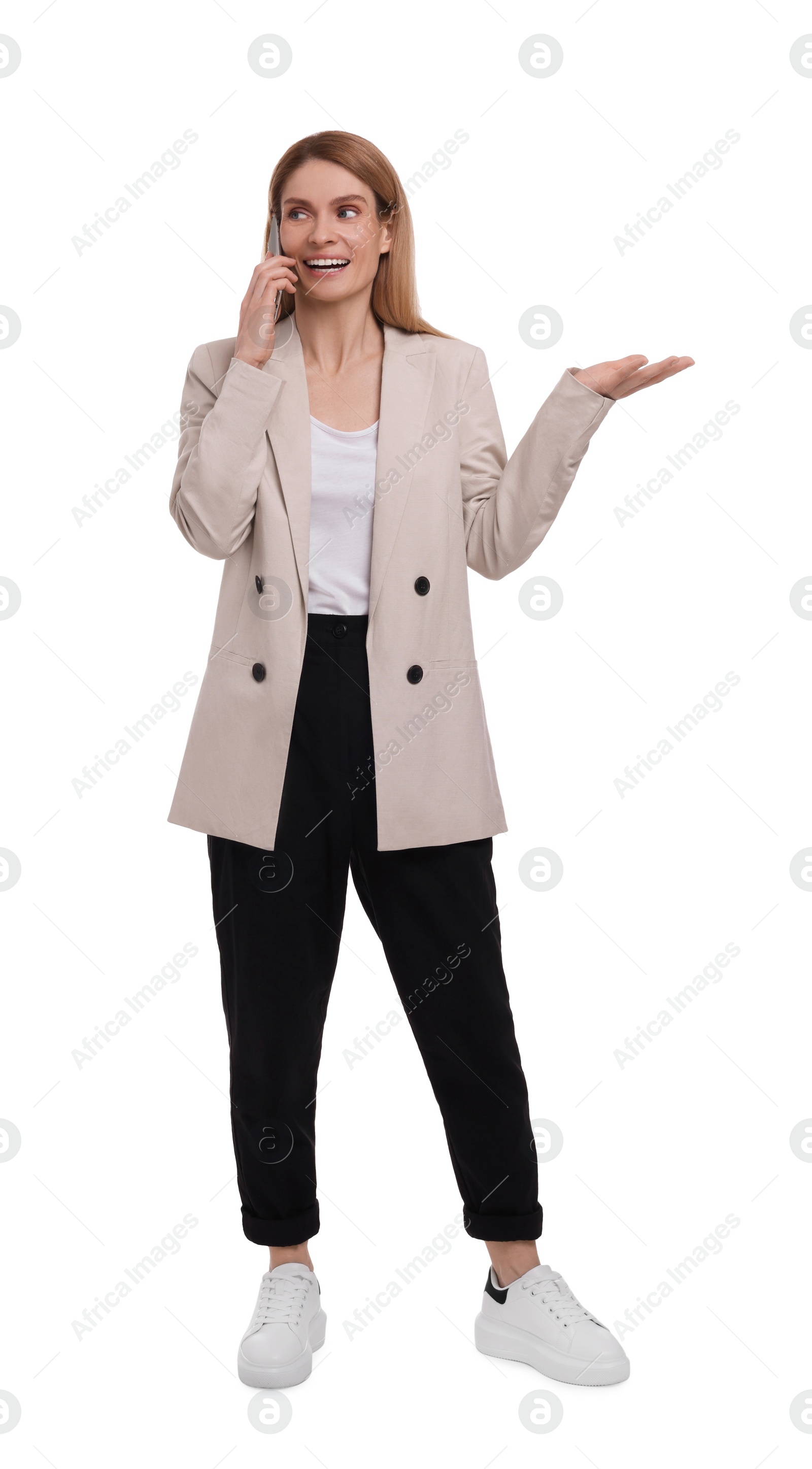 Photo of Beautiful happy businesswoman talking on smartphone against white background