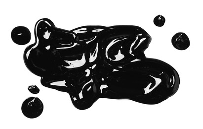 Blots of black glossy paint on white background, top view