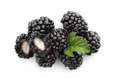 Photo of Tasty ripe blackberries and leaf on white background, top view